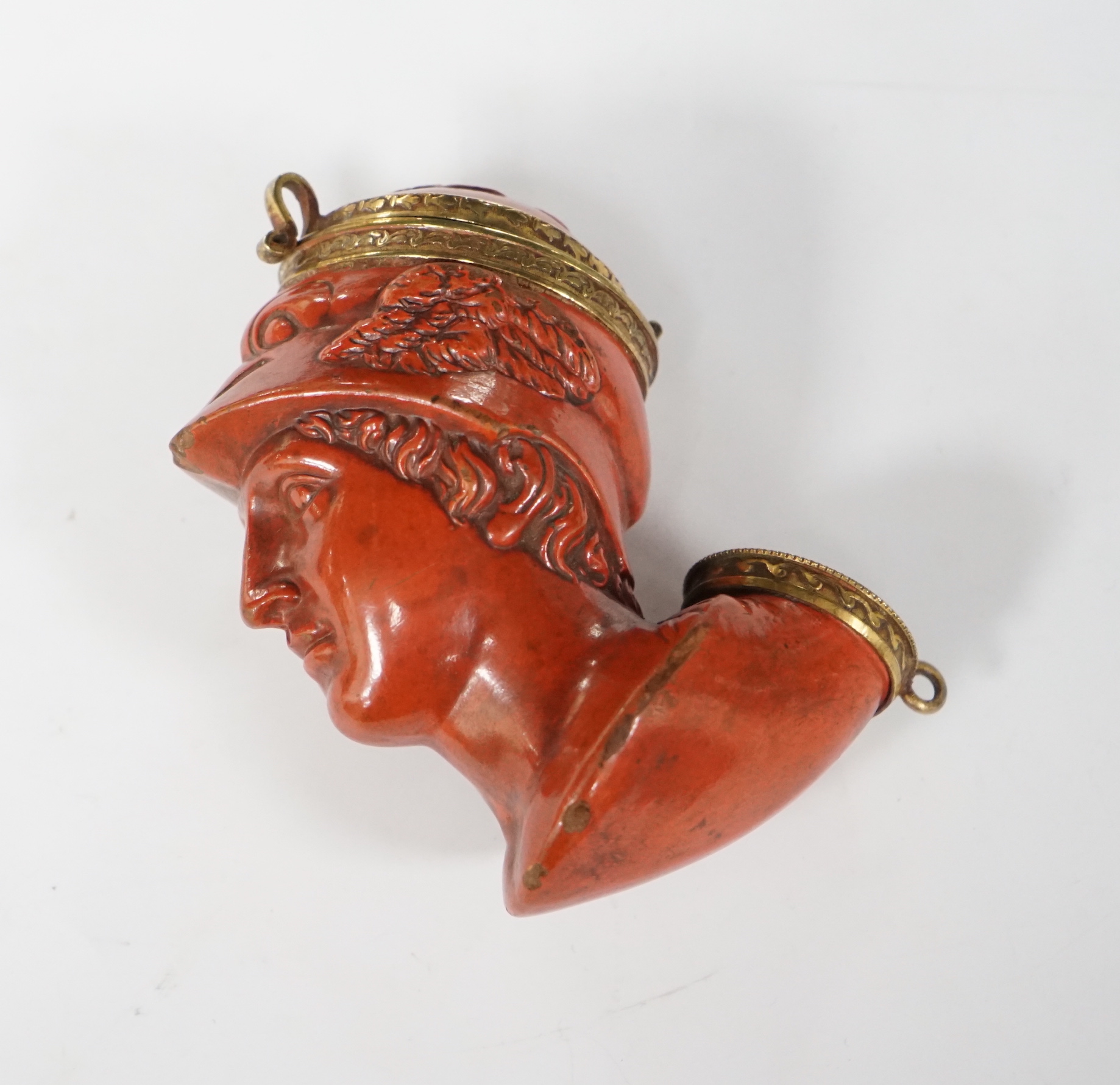 A 19th-century French terracotta pipe modelled as the bust of Hermes, approximately 10cm high